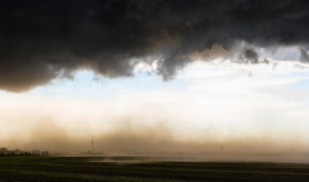 Dust Blowing Under Dark Storm Clouds