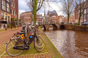 Amsterdam canal Leidsegracht with typical dutch houses and bridge, Holland, Netherlands