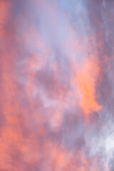 Colorful sunset sky in purples, pinks, oranges, and blues, beautiful cloudscape background