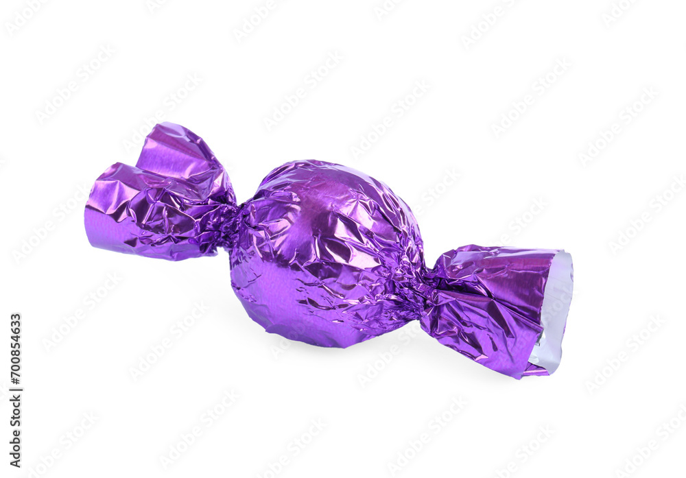 Canvas Prints Tasty candy in purple wrapper isolated on white