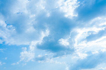 Blue Sky Light Ray background and fluffy white large cloud