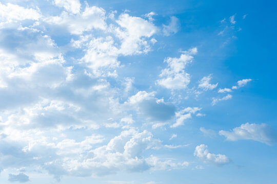 Blue Sky Light Ray background and fluffy white large cloud