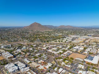 Foto op Canvas Scottsdale city center aerial view on Scottsdale Road at Main Street with Camelback Mountain at the background in city of Scottsdale, Arizona AZ, USA.  © Wangkun Jia