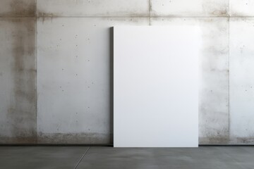 A blank poster mock-up against a concrete wall