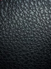 Black artificial leather sheet There is a pattern of cracked sesame patterns.