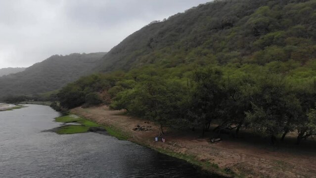Wadi Darbat, with rain drops and green mountains