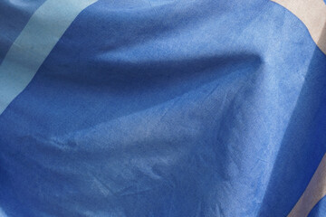 Blue cloth background abstract with soft waves