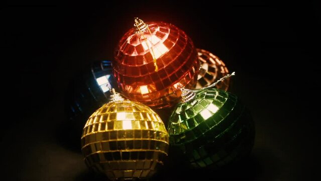 Multi-color retro disco balls rotating 