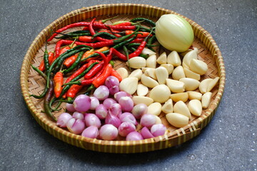 Onion and chilies in a tray 