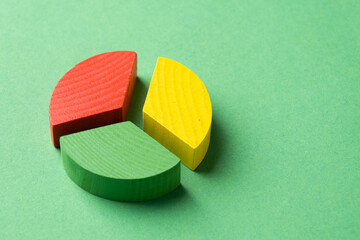 Colorful wooden pie chart pieces