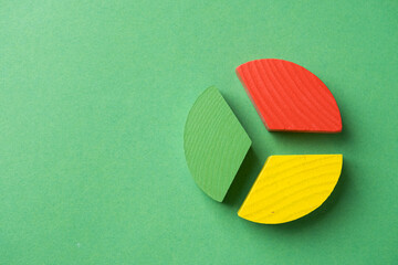 Colorful wooden pie chart pieces - obrazy, fototapety, plakaty