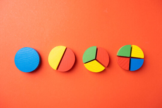 Colorful wooden pie chart pieces