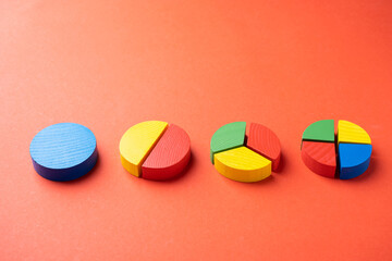Colorful wooden pie chart pieces