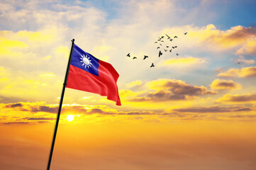 Waving flag of Taiwan against the background of a sunset or sunrise. Taiwan flag for Independence...