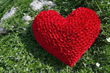 A heart made of red flowers. Generative AI