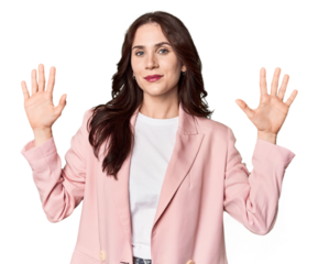 Young Caucasian woman in a studio setting showing number ten with hands.