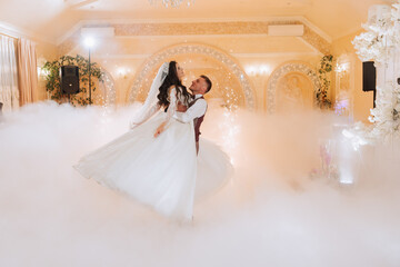 the wedding of the bride and groom in an elegant restaurant with great light and atmosphere. The...