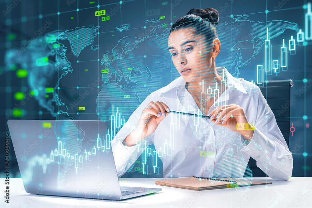 Canvas Prints Attractive young european businesswoman using laptop at desk with growing upward chart, map, arrows and forex graph on blurry background. Global trends, trading and finance concept. Double exposure.