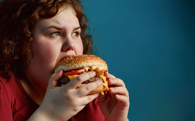 Very fat girl eats junk food, hamburger fries fast food overweight