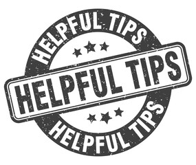 helpful tips stamp. helpful tips label. round grunge sign