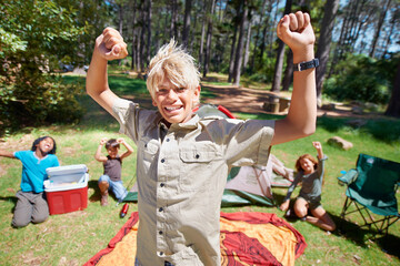 Happy boy, portrait or camping success in nature celebration for winning or goal on holiday...