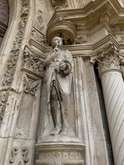Saint Martin's catholic church, L'isle-Adam. Statue and reliefs