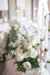 Wedding or event table decorated using white flowers