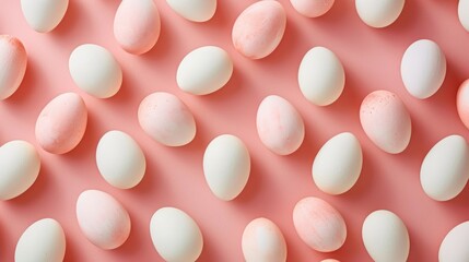 Pattern of peach and white Easter eggs over pastel background. Easter day