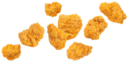 Falling chicken nuggets isolated on white background