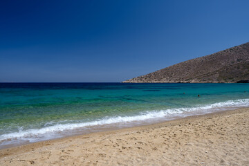 Panoramic view of the amazing sandy and turquoise dream beach of Agia Theodoti in Ios Cyclades...
