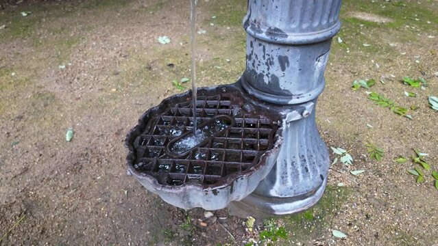 Ancient water fountain in the Campo Grande public park in Valladolid, Spain.
