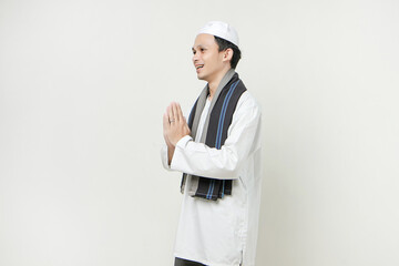 happy asian muslim man greeting gesture. People religious Islam lifestyle concept. celebration...