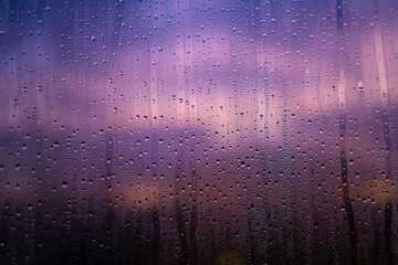drops of water on the glass. rain outside the window. condensation on the glass. beautiful view from the window. rain drops on the window and glass.