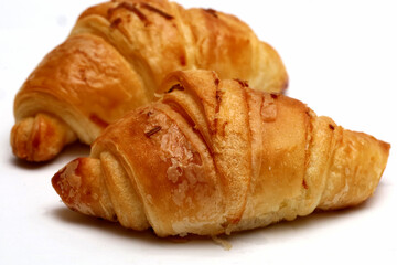 croissant closeup, isolated on white background.