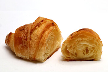 croissant closeup, isolated on white background.