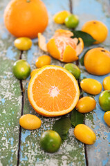 Fresh citrus fruits on the wooden table