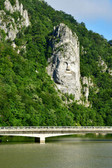 Fototapeta na wymiar Carpathian mountains, Romania - june 29 2023 : Decebalus rock sculpture