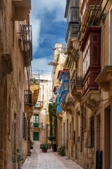 Fototapeta na wymiar idyllic picturesque city street in downtown Birgu in the Three Cities of Valletta