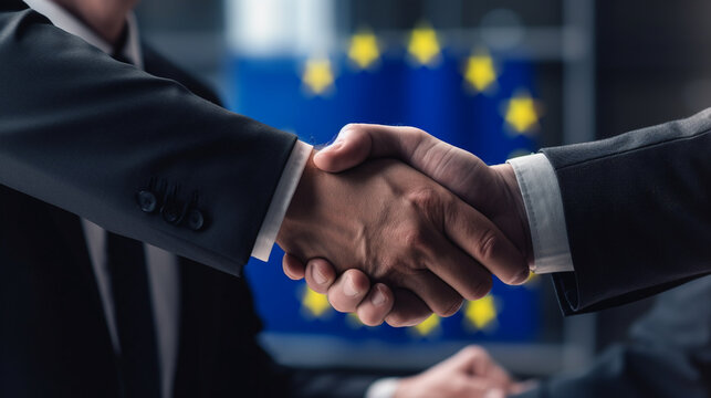 Men shaking hands against flag of European Union, closeup. International relationships