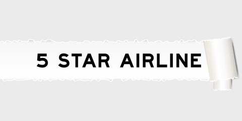 Ripped gray paper background that have word 5 star airline under torn part