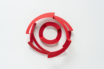 Fototapeta premium machine-cut red paper rings (some with folds) isolated on white