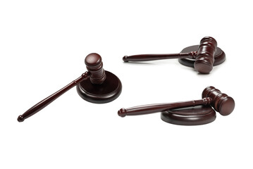 Wooden judge gavel and soundboard isolated on a white background.