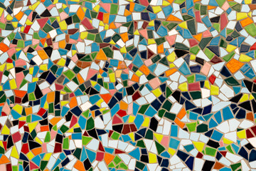 Multicolored mosaic tiles on a wall