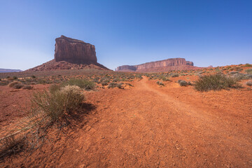 hiking the wildcat trail in monument valley, arizona, usa