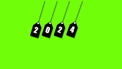 Obraz na płótnie Canvas Four black tags with the numbers 2024 hanging against a bright green background.