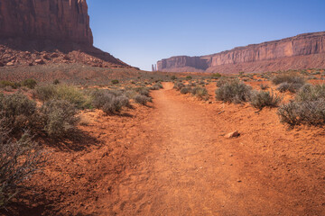 hiking the wildcat trail in monument valley, arizona, usa