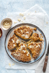 Sbrisolona: italian homemade cake. Some ingredient: eggs; sugar; flour; butter; pine nuts; walnuts, hazelnuts, almonds.