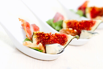 Colorful dish with fresh exotic fruit and tasty cheese in restaurant