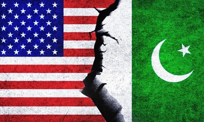 USA and Pakistan flags on a wall with a crack. Pakistan and United States of America political conflict, war crisis, economy, relationship, trade concept
