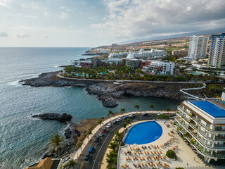 Fototapeta premium ocean blue water shore and mountains of Playa Paraiso, Tenerife, Canary island
